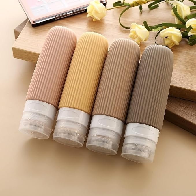 4pcs Silicone Gel Portioning Bottles Set for Body Wash, Skincare Lotion - Saadiq.pk