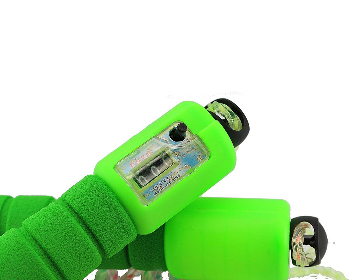 Green roller skates with black wheels on a white background
