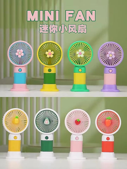 Mini Handheld Cooling Fan – Portable USB Rechargeable Fan (Random Character)