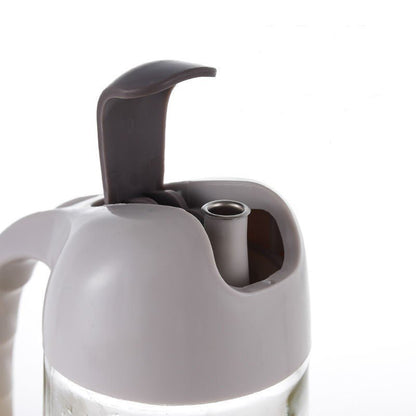 Oil Jug Dispenser (600 ml) – Automatic Flip Cap, Leak - Proof Glass Bottle - Saadiq.pk