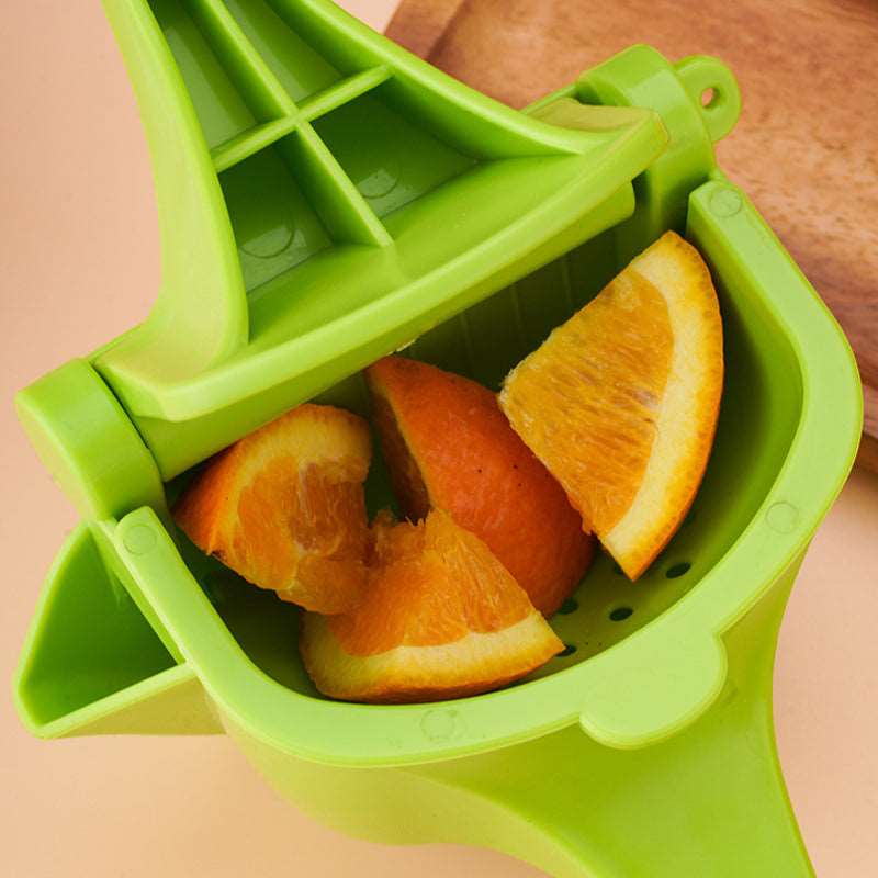 Plastic Manual Juice Hand Squeezer – Easy Fruit Press Juicer - Saadiq.pk